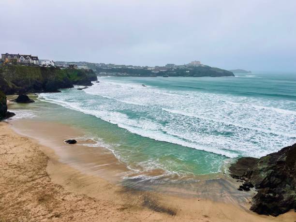 istock Newquay Cornwall winter storm sea beach cold day freezing rocks cliffs 1384590686