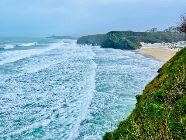 istock Newquay Cornwall winter storm sea beach cold day freezing rocks cliffs 1384591224