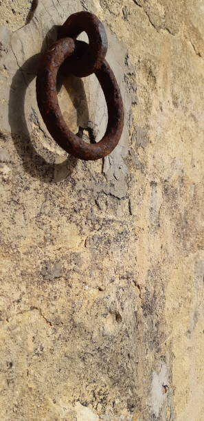 istock Old Rusty Wall Horse-Mount in Gozo 1384591233