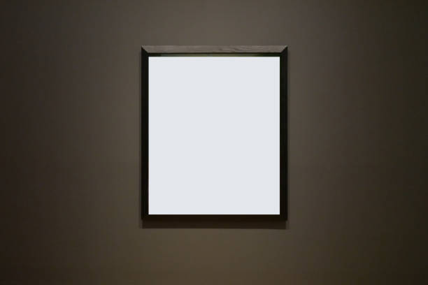 istock Blank picture frame mockup on black background 1384591336