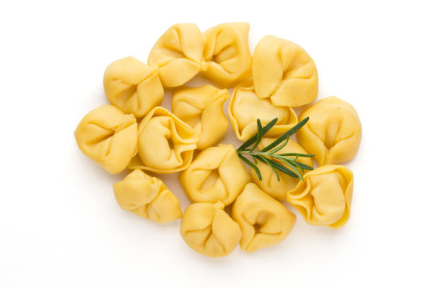 istock Raw homemade pasta,tortellini with herbs. 1384591408