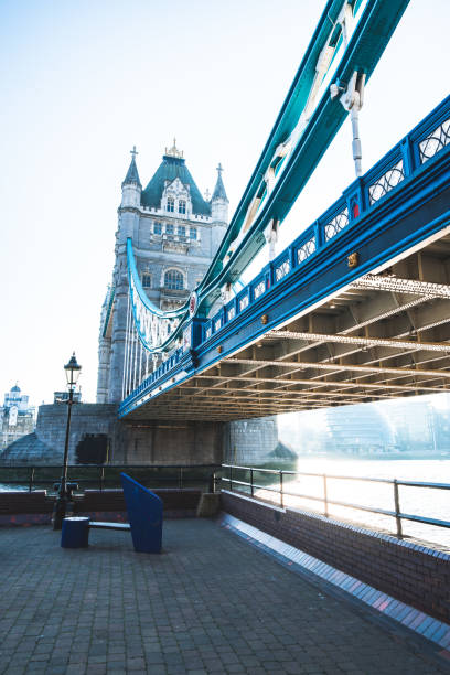 Tower Bridge on the banks of Thames river in London. Tower Bridge on the banks of Thames river in London. tower bridge london england bridge europe stock pictures, royalty-free photos & images