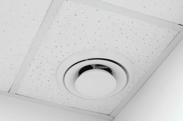istock Round ventilation duct on the ceiling. Modern ventilation built into the ceiling. 1384596323