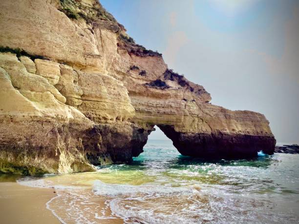 istock Portimao Portugal cliffs rocks sea beach 1384600373