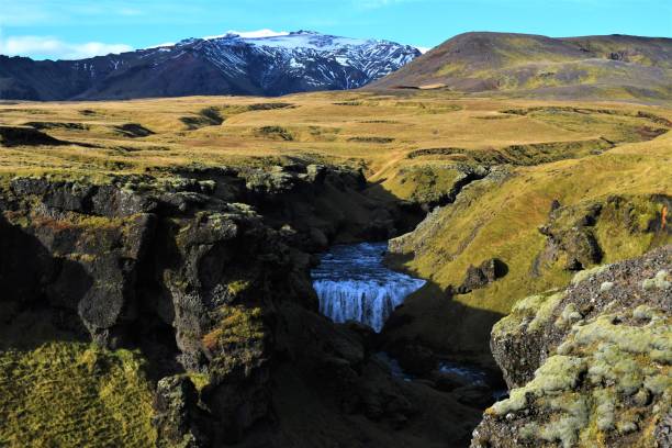 istock Waterfall and mountain view in Iceland 1384600496