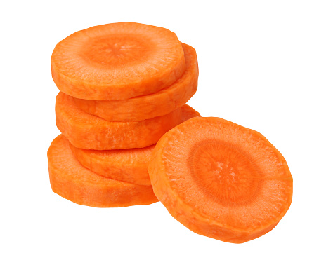 peeled raw carrots, isolated on a white background. stack of round pieces.