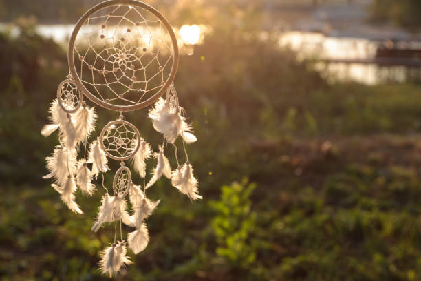 istock Beautiful handmade dream catcher outdoors. Space for text 1384610296