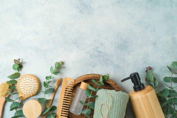 istock Zero waste bathroom accessories on gray concrete background. Personal  hygiene concept  Top view with copy space 1384610579