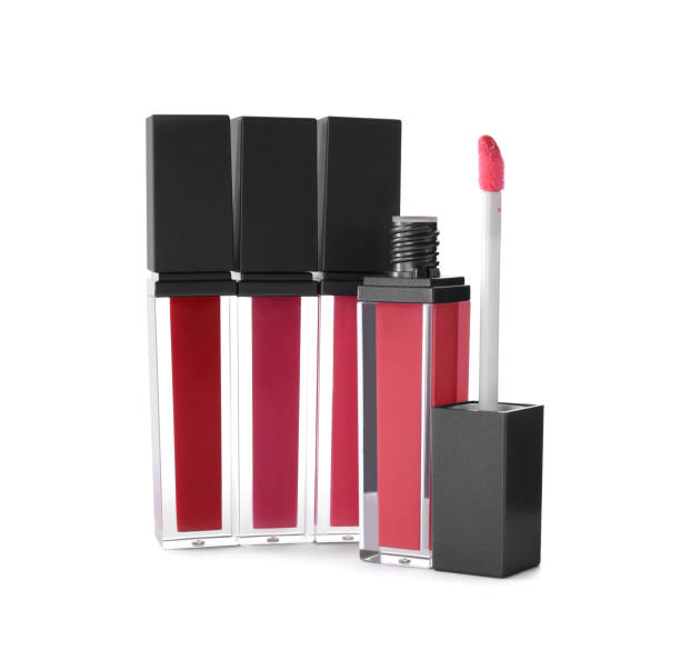 istock Different liquid lipsticks on white background. Makeup product 1384611880