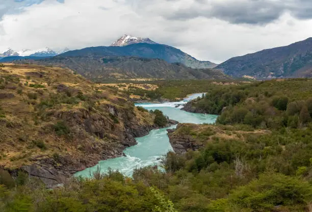 Photo of The confluence of the Baker river (with bright turquoise waters) with the Neff river (with greyish waters) near the Patagonia National Park on route 7 (Carretera Austral), Cochrane, Patagonia, Chile