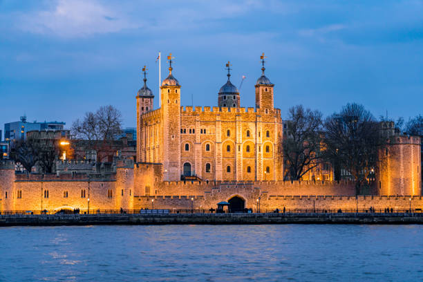 Tower of London at night, UK Tower of London at night, UK arrowslit stock pictures, royalty-free photos & images