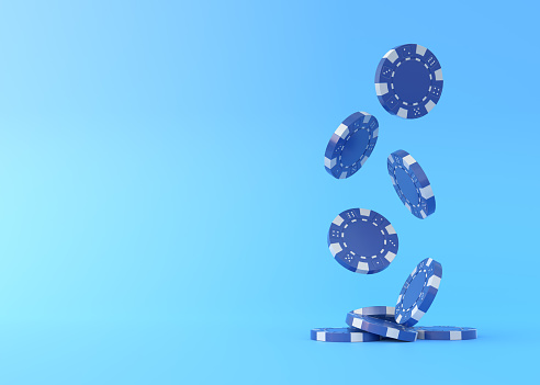 Lots of blue poker chips falling down on a blue background with copy space. Creative minimal sport and gambling concept. Casino concept. 3d rendering 3d illustration