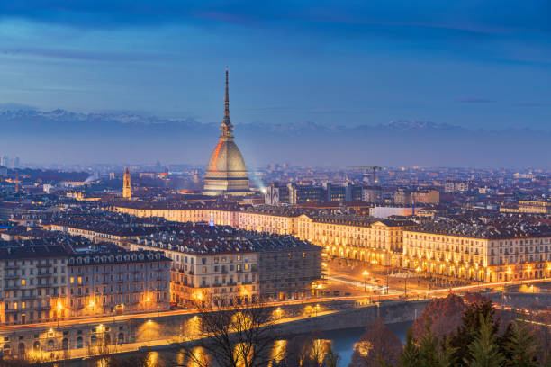 Turin, Piedmont, Italy skyline with the Mole Antonelliana Turin, Piedmont, Italy skyline with the Mole Antonelliana at dusk. turin stock pictures, royalty-free photos & images