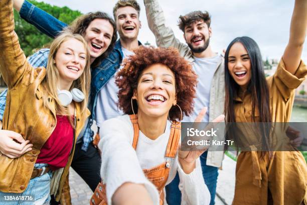 Group Of Happy Friends Taking Selfie Pic Outside Happy Different Young People Having Fun Walking In City Center Youth Lifestyle Concept With Guys And Girls Enjoying Day Out Together Stock Photo - Download Image Now