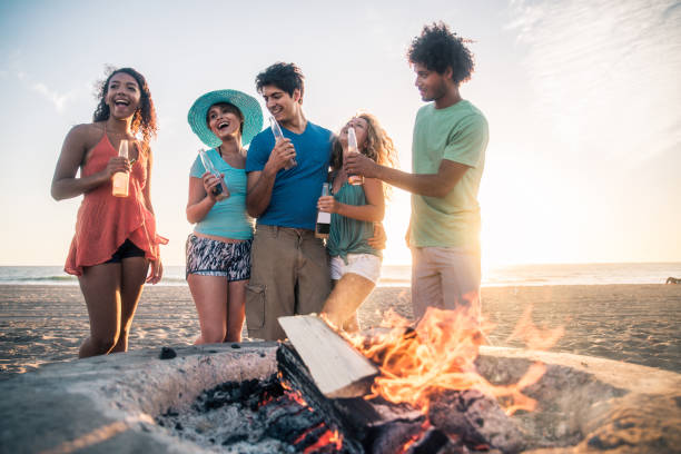 istock Friends partying on the beach 1384626085