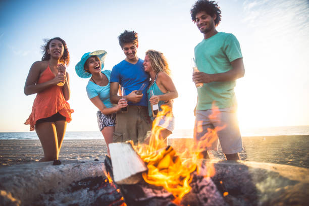istock Friends partying on the beach 1384626190