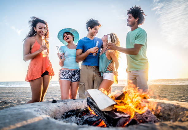 istock Friends partying on the beach 1384626846