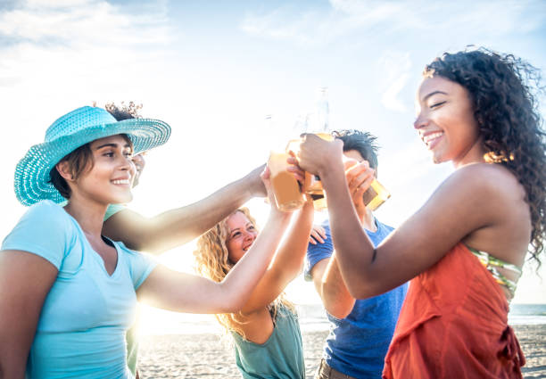 istock Friends partying on the beach 1384627582