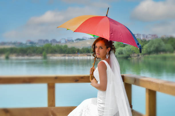 Bride portrait with parasol.