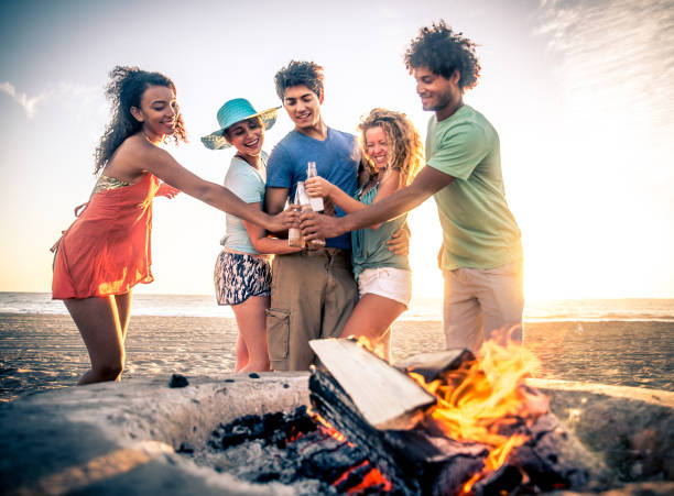 istock Friends partying on the beach 1384627644