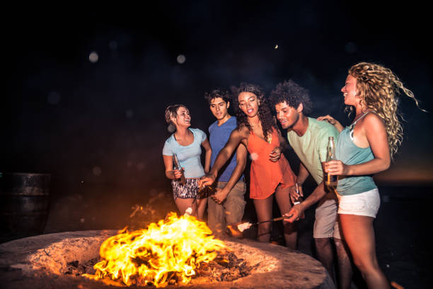 istock Friends partying on the beach 1384628940
