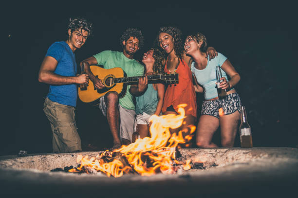 istock Friends partying on the beach 1384629060