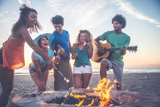 istock Friends partying on the beach 1384629191