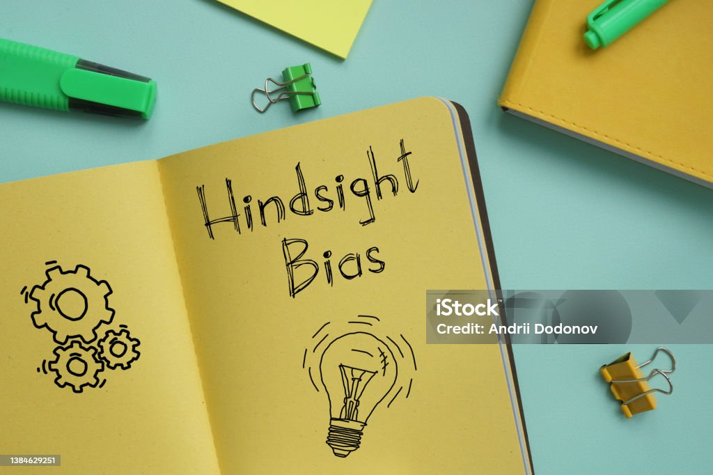 Hindsight bias is shown on the photo using the text Hindsight bias is shown on a photo using the text Agreement Stock Photo