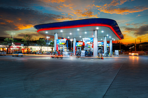 Samut Sakhon, Thailand, January 23, 2022:View of PTT gas station at night, Ratchaburi Thailand. Select focus.