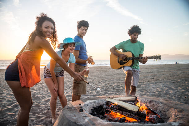 istock Friends partying on the beach 1384629434