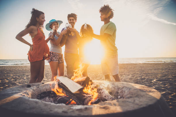 istock Friends partying on the beach 1384629462