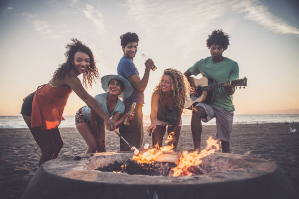 istock Friends partying on the beach 1384630104