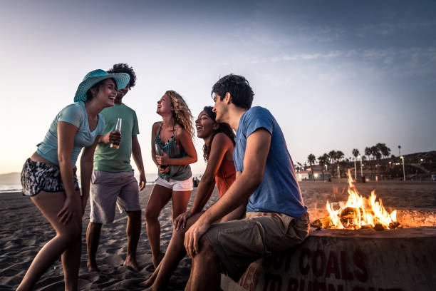 istock Friends partying on the beach 1384630198