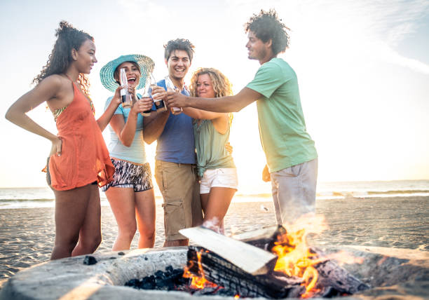 istock Friends partying on the beach 1384630449