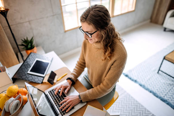 istock Woman working from home. 1384637465