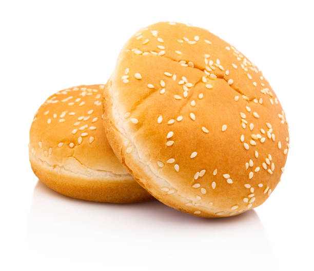 istock Two hamburger buns with sesame isolated on white background 1384640669