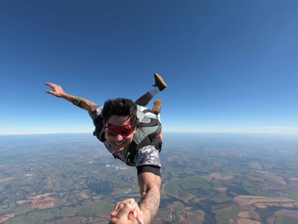 istock Relaxed and happy skydiver man on a summer day. 1384641653