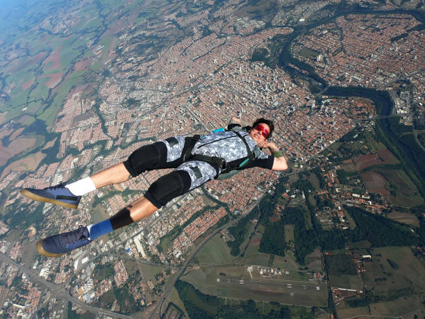 istock Relaxed and happy skydiver man on a summer day. 1384641693
