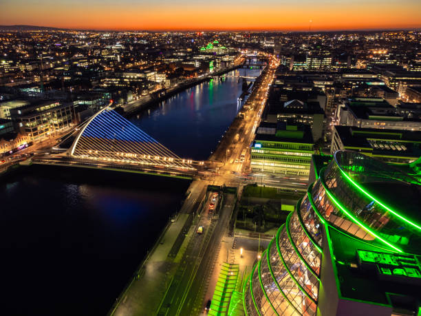 Dublin city at night Dublin city at night with lights on and the sunset ireland stock pictures, royalty-free photos & images