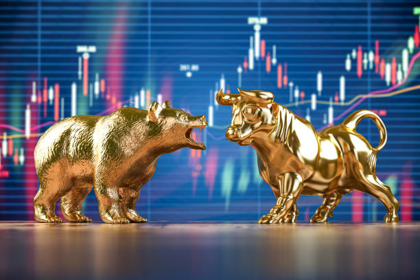 Golden bull and bear on stock data chart background. Investing, stock exchange financial bearish and mullish market concept. stock photo