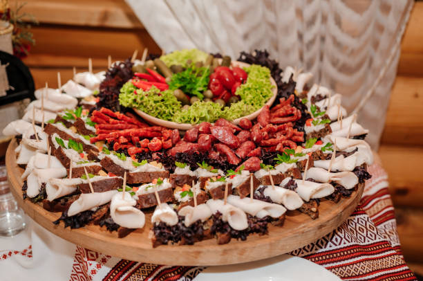 istock Slicing different types of meat. Meat snacks on the table. wedding buffet. Catering 1384646812