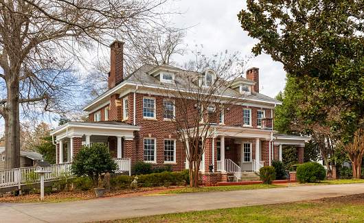 Belmont, NC, USA-8 March 2022: Elegant historic home on North Main in downtown.