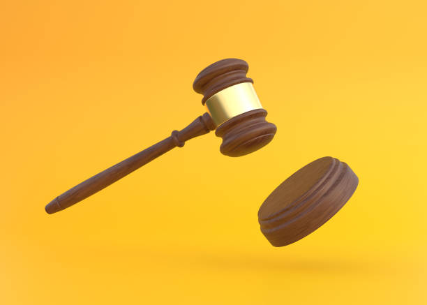 Judge gavel on a yellow background with copy space Judge gavel on a yellow background with copy space. Minimal creative court concept. 3d rendering 3d illustration lawyer hammer stock pictures, royalty-free photos & images