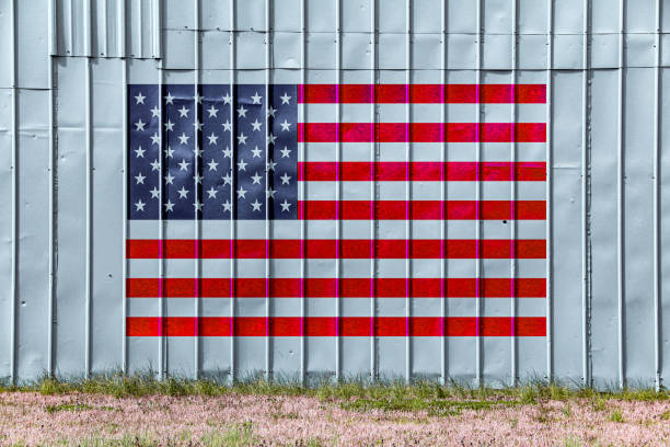 istock beautiful blue warehouse factory wall grass sunlight 1384659698