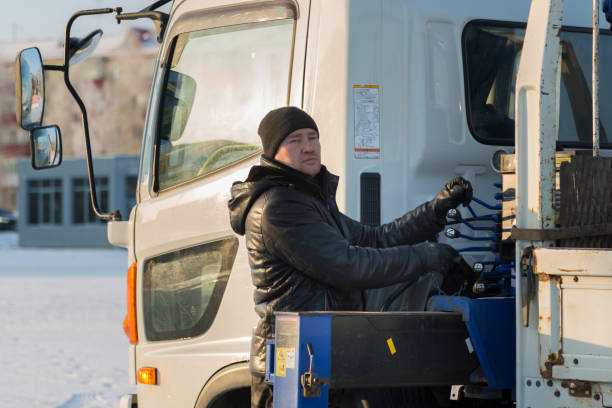 istock The driver of the hydraulic manipulator in the workplace 1384670844