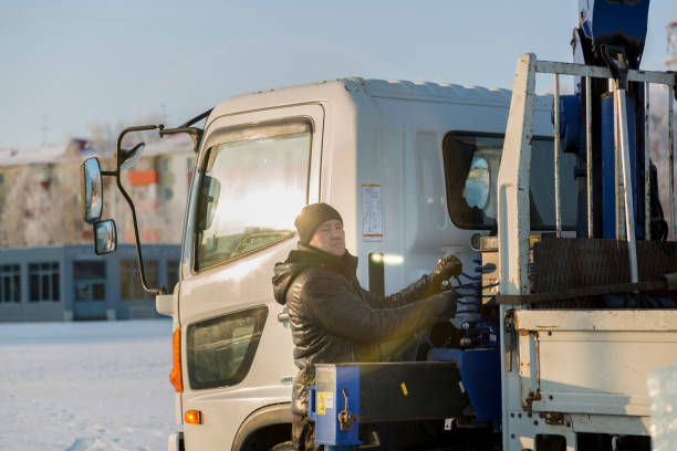 istock The driver of the hydraulic manipulator in the workplace 1384670852