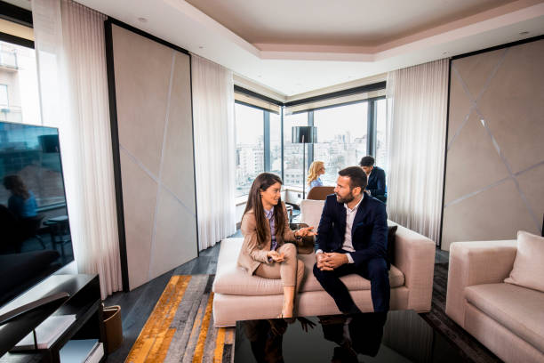 istock Colleagues seen in a hotel room 1384671762