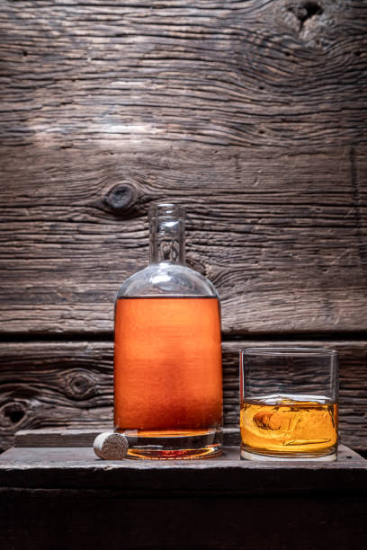 istock Aged and good cognac in old distillery warehouse. 1384671979