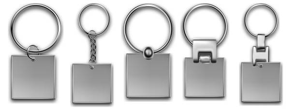 istock Holder trinket in square shapes isolated on white background. Realistic template metal keychain set. Trinket keyring, keyholder and breloque illustration. 1384699628