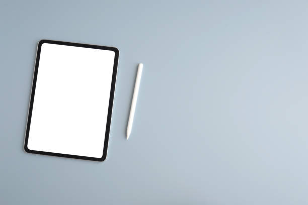 istock Digital tablet with blank on screen isolated on gray background, banner for template, mock up, topview, flat lay, communication technology 1384699655